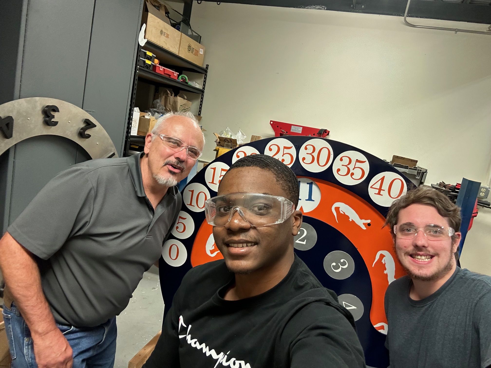 Photo with Dr. Griffis, Emmanuel, and I